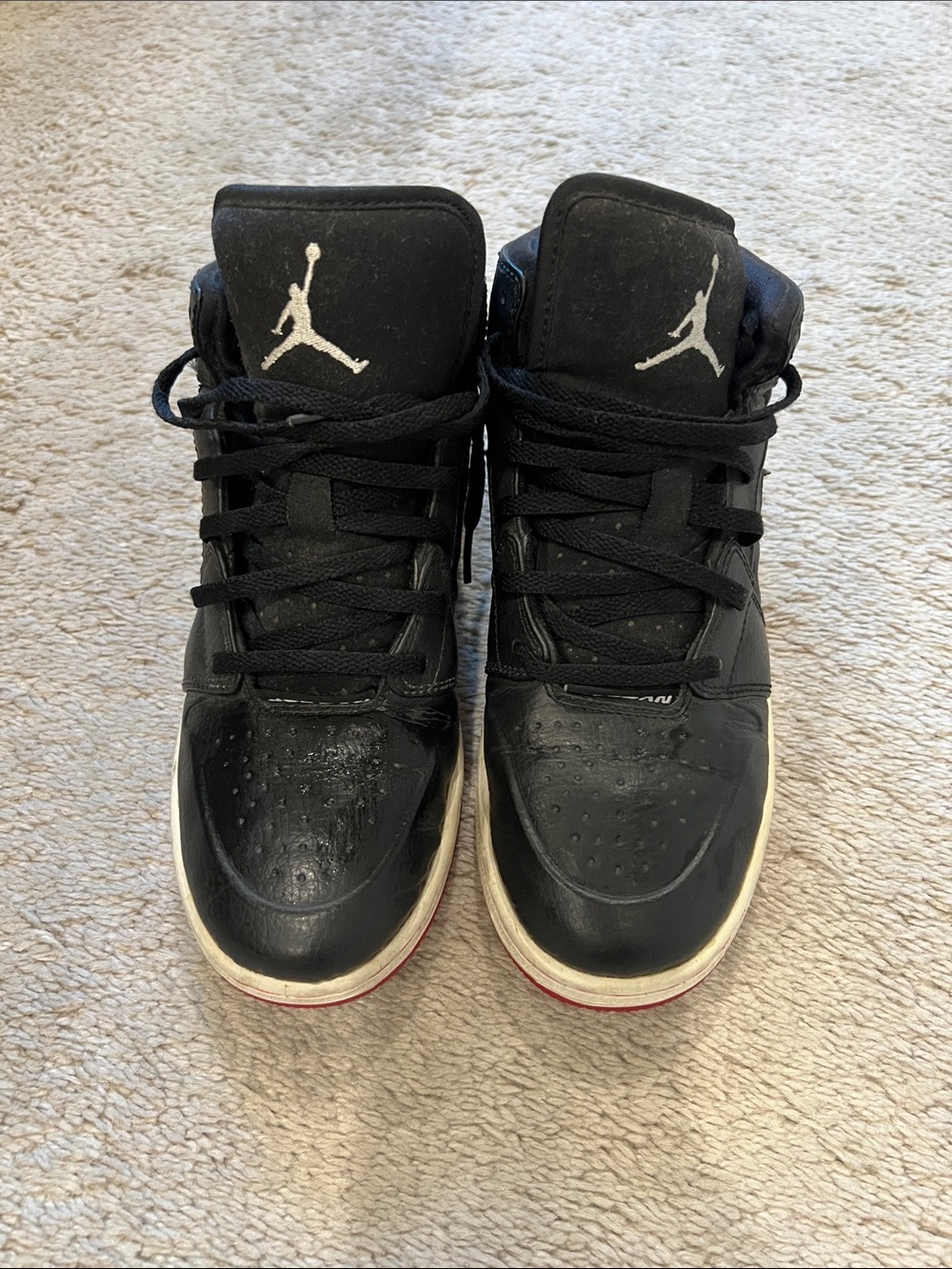 Jordan Black High-Top Sneakers with White Jumpman and Red Outsole Accent
